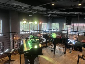 Crowd enjoying the dueling pianos at Kirwan’s on the Wharf