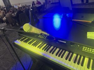 Diverse crowd enjoying the dueling pianos